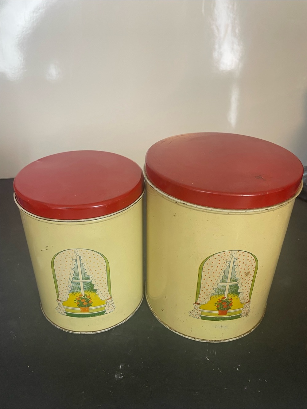 Vintage Yellow Metal Canisters with Red Lids - Set of 2